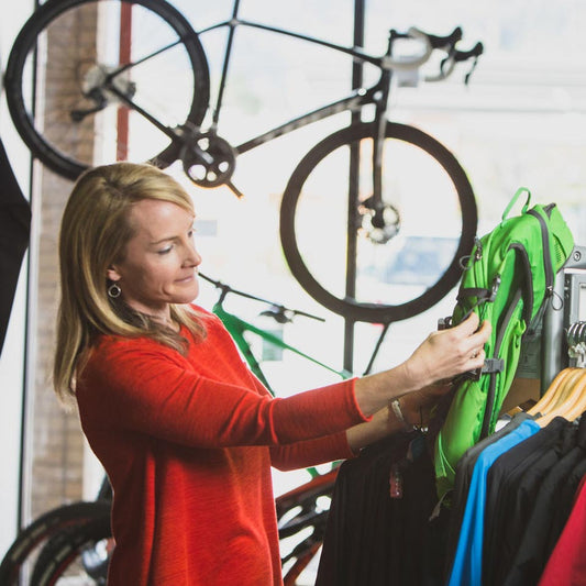 Woman shopping for bicycle clothes