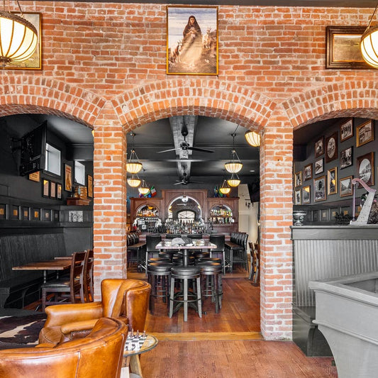 Storefront of restaurant with sofas
