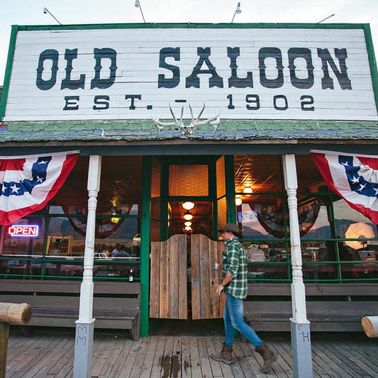 Cowboy entering Old Saloon front