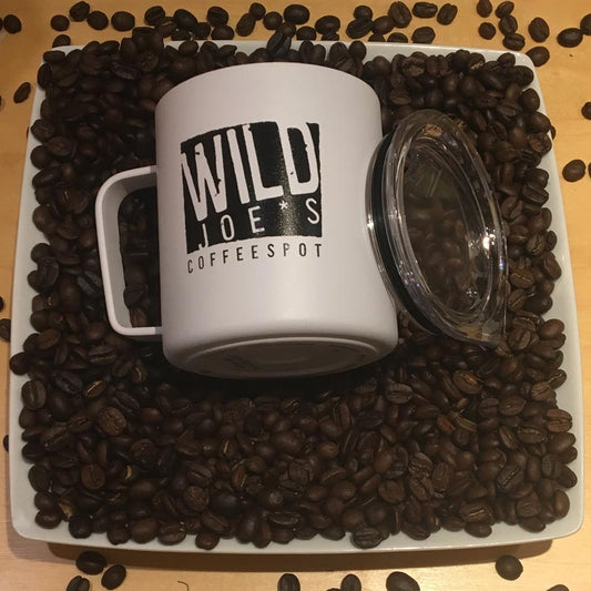 Wild Joe's mug on a plate of coffee beans